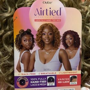 OUTRE Airtied Human Hair Blend. Women’s Wavy Lace Front Wig.